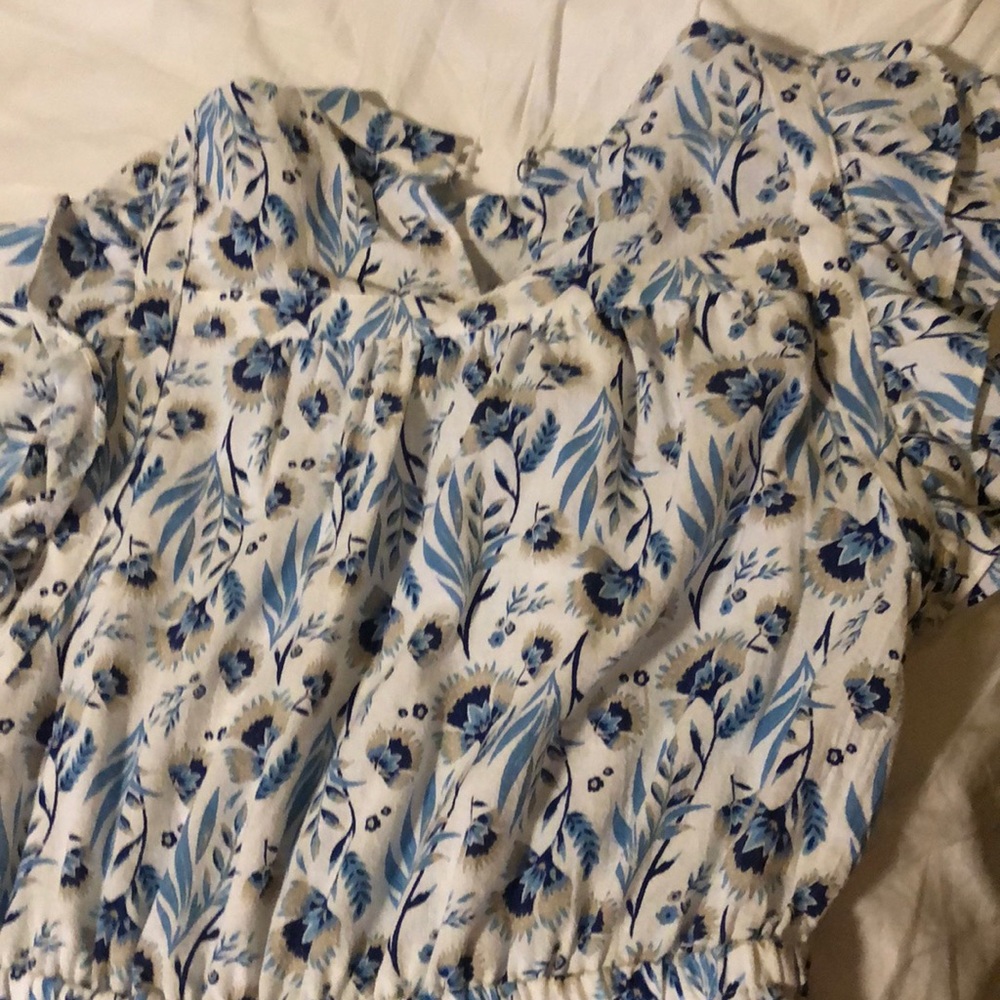 White Ruffle Dress with Blue Flowers.